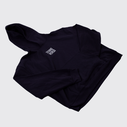 Navy hoodie with stacked embroidered Studio VERSŌ logo on the chest